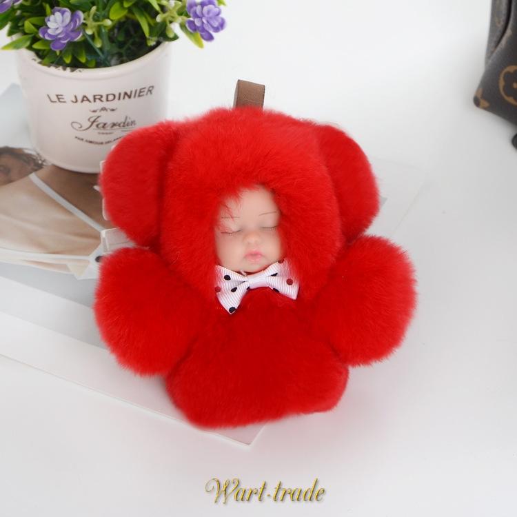 Chlupatá klíčenka - Spící miminko v kožešině červené