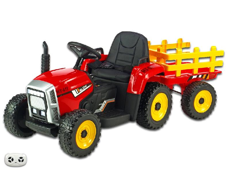 Elektrický rozkošný traktor s vlekem červený